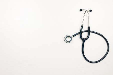 Stethoscope in doctors deskの写真素材