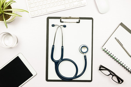 Stethoscope in doctors deskの写真素材