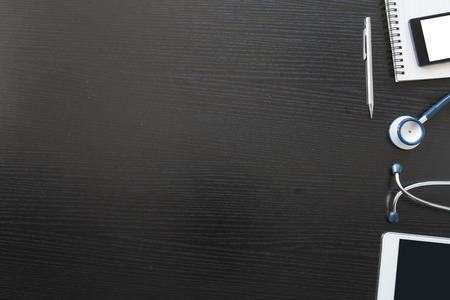 Stethoscope in doctors deskの写真素材