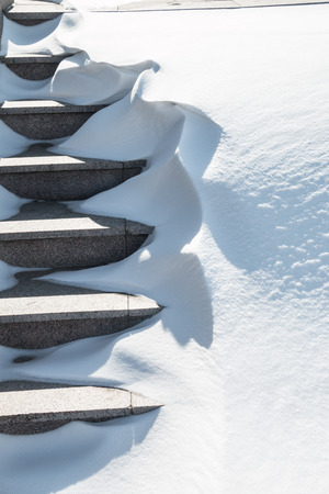 Snow on the stairsの写真素材