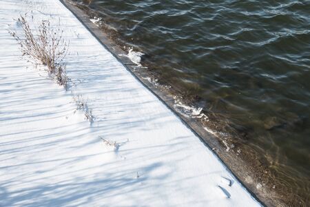 Winter river in the snowの写真素材