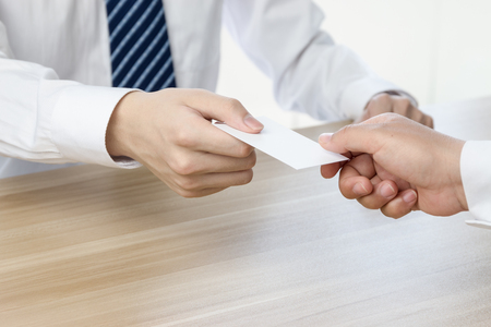 Businessman exchanging business cardsの写真素材