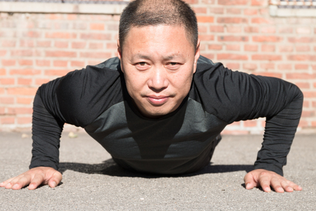 Asian man in outdoor fitness
