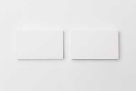 Business card on white backgroundの写真素材