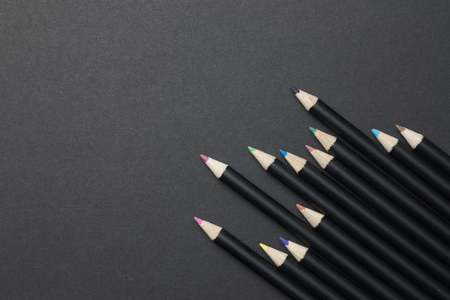 Black color pencil on black backgroundの写真素材