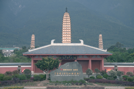 The stone tablet is engraved with "National Five-A Grade Scenic Spot and Chongsheng Temple Three Pagodas Cultural Tourism Area."のeditorial素材