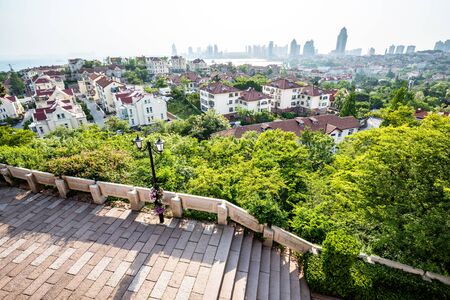 Red houses and trees in Qingdao, Chinaの写真素材