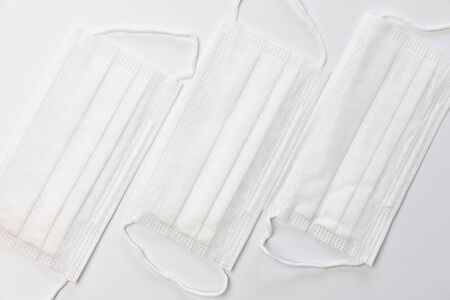 Medical mask on gray background