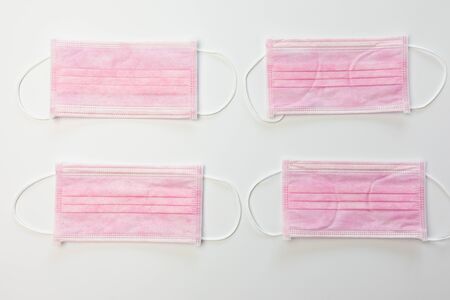 Medical mask on gray background