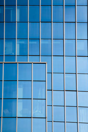 Closeup modern blue glass building