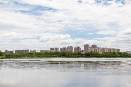 lake with buildings and parksの写真素材