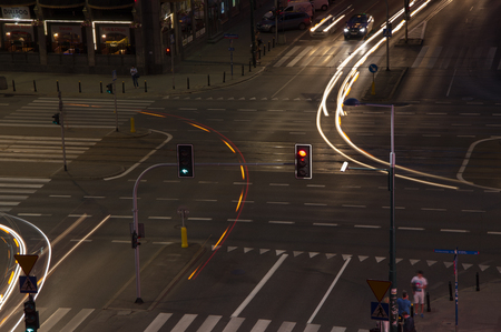 Warsaw, Poland - June 23, 2016. Night road intersection in the Polish capital. With the arrival of the night, the movement does not stop, but becomes more vivid.のeditorial素材
