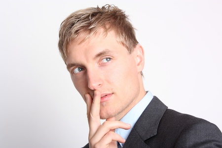 Contemplatively young businessman