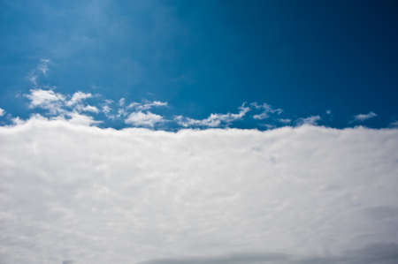overcast, clouds on a deep blue sky