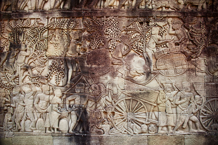 the ancient ornament on the wall in Angkor Watの写真素材