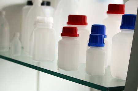 White laboratory plastic bottles for a medicine