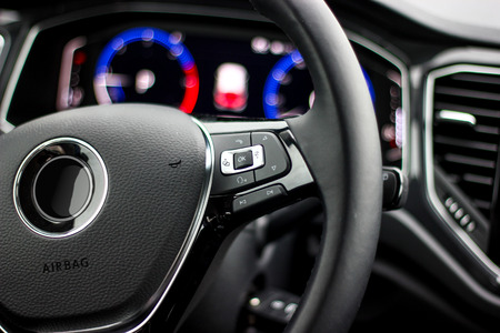 control buttons on steering wheel close upの写真素材