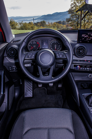 dashboard and steering wheel close upの写真素材