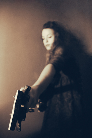 Girl hold guitar in her handsの写真素材