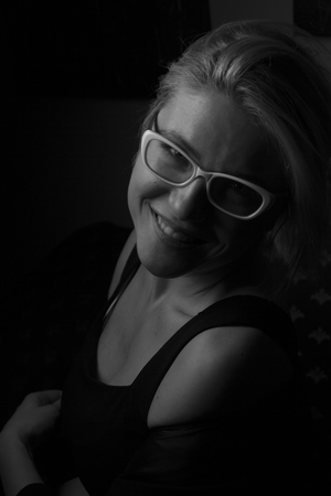 Isolated girl with glasses posingの写真素材