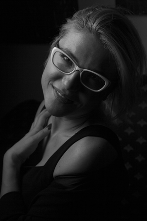 Isolated girl with glasses posingの写真素材