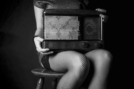 sexy women legs and vintage radioの写真素材