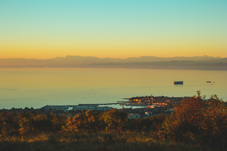 Aerial view of old fishing town Izola. Colorful spring evening on Adriatic Sea. Beautiful seascape of Slovenia, Europe. Beauty of countryside concept background. Artistic style post processed photo.の写真素材