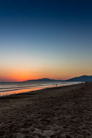 Sunset over the ocean, Tarifa, Spainの写真素材