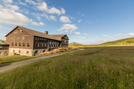 Landscape with grass field and nice clouds in Krkonose, Czech Republicのeditorial素材