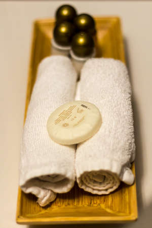 White towels, soap, shampoo in bathroom on hotelの写真素材