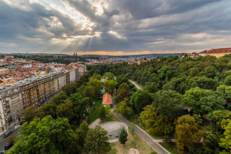 View of Prague taken from Nuselsky bridge on sunset captures typical local architecture from aerial...