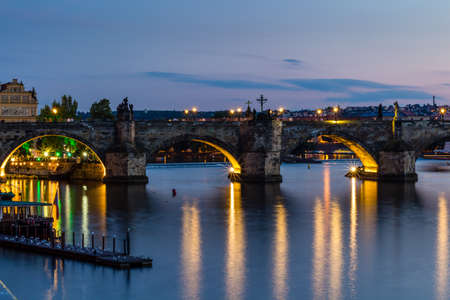 Prague, Czech Republic. Night photo of Charles Bridge, Castle and historical buildingsの写真素材