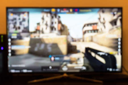 Counter-strike professional game on tv and remote controlの写真素材
