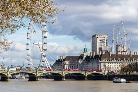 Cityscape of London including London Eye and Westminster Bridge on Thames Riverのeditorial素材