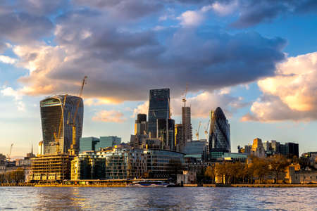Skyscrapers of the City of London over the Thames , Englandの写真素材