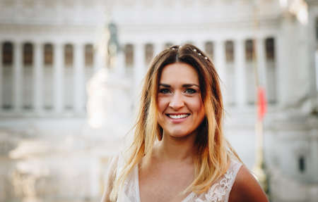 Portrait of a beautiful smiling bride outdoorの写真素材