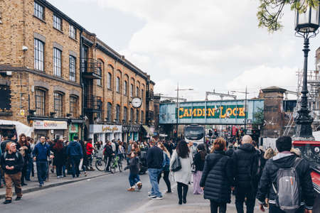 London, UK - 2nd of April, 2017: Camden Lock Bridge which is a famous alternative culture shops in Camden Town, London, its markets are visited by more than 5 million people every yearのeditorial素材