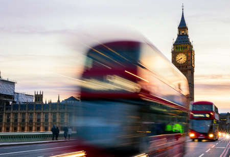 The Big Ben, House of Parliament and double-decker bus blurred in motion, London, UKの写真素材