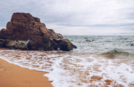 Spectacular natural cliffs and stone arch Arche de Port Blanc and beautiful famous coastline, Brittany (Bretagne), France, Europeの写真素材