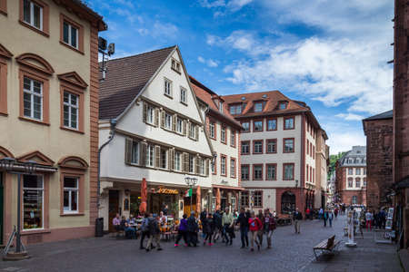 Heidelberg, Germany - May 6, 2017: Marketplace crowded with tourists and Town Hall in Heidelberg in Germany. Heidelberg is a city in Baden-Wurttemberg in Germany.のeditorial素材