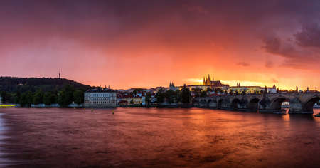 Fantastic natural phenomena summer storm over Charles bridge, Prague castle and Vltava river in Prague, Czech Republicのeditorial素材