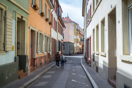 Heidelberg, Germany - May 6, 2017: Marketplace crowded with tourists and Town Hall in Heidelberg in Germany. Heidelberg is a city in Baden-Wurttemberg in Germany.のeditorial素材
