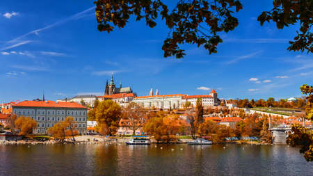 Prague Castle and Old City day view with blue sky, travel vivid autumn european background. Czech Republicの写真素材