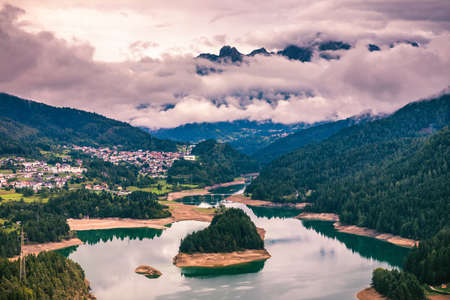 Panoramic view of lake of Centro Cadore in the Alps in Italy, Dolomites, near Belluno.