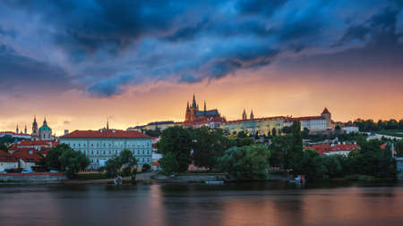 Prague old town including Prague castle in the background, one of the most famous landmarks of Prague at sunset with dramatic sky.のeditorial素材