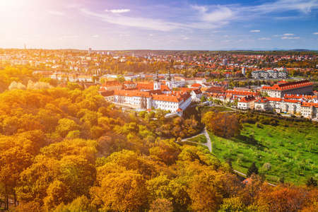 Prague, Czezh Republic. Scenic autumn aerial view of the Old Town with red foliageの写真素材