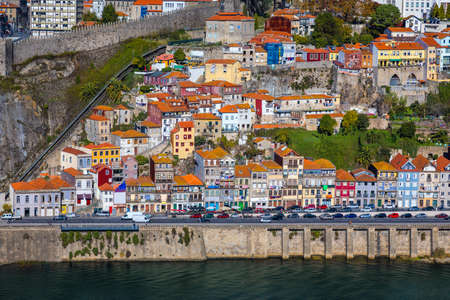 Panoramic view of Old city of Porto (Oporto) and Ribeira over Douro river, Portugal. Concept of world travel, sightseeing and tourism.の写真素材