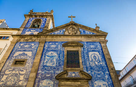 Traditional historic facade in Porto decorated with blue hand painted tin-glazed tiles, Oporto, Portugalの写真素材