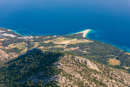 Beautiful panorama of famous Adriatic beach Zlatni Rat (Golden Cape or Golden Horn) with turquoise water , Island of Brac Croatia summertime. Famous Adriatic beach Zlatni Rat in Bol, Brac, Croatia.の写真素材