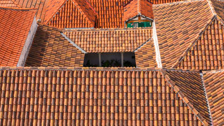 Trogir in Croatia, town panoramic view with red roof tiles, Croatian tourist destination. Trogir town sea front view, Croatia. Roofs of Trogir in Croatia.の写真素材